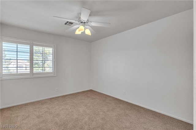 8437 Apple Hill Ct, Las Vegas, NV 89128 - unfurnished room with carpet flooring, baseboards, and a ceiling fan