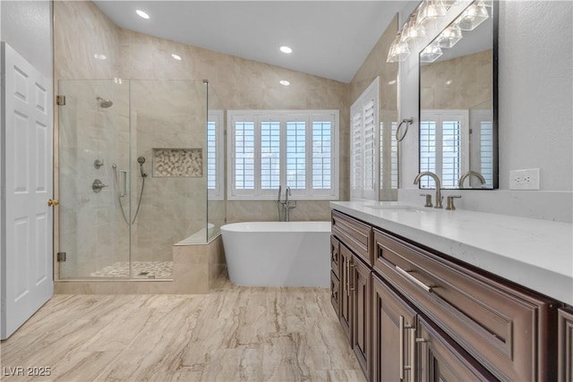 8437 Apple Hill Ct, Las Vegas, NV 89128 - full bathroom featuring a stall shower, a soaking tub, vanity, lofted ceiling, and marble finish flooring