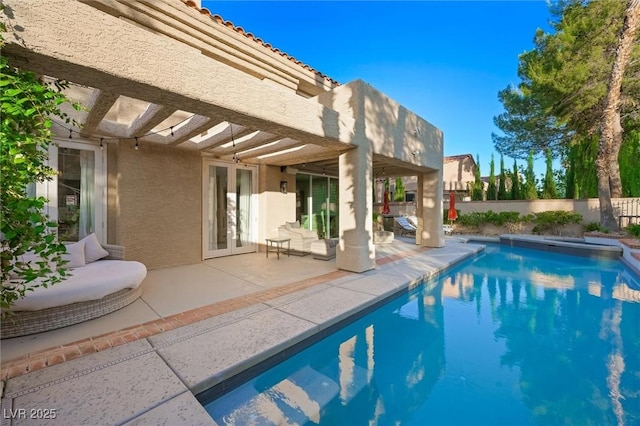 5125 Turnberry Ln, Las Vegas, NV 89113 - view of pool featuring a patio, a fenced backyard, and french doors