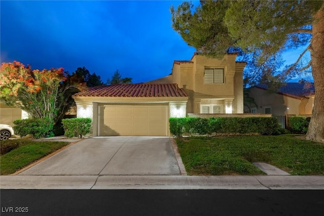 5125 Turnberry Ln, Las Vegas, NV 89113 - mediterranean / spanish-style house with stucco siding, an attached garage, concrete driveway, a tile roof, and a front lawn