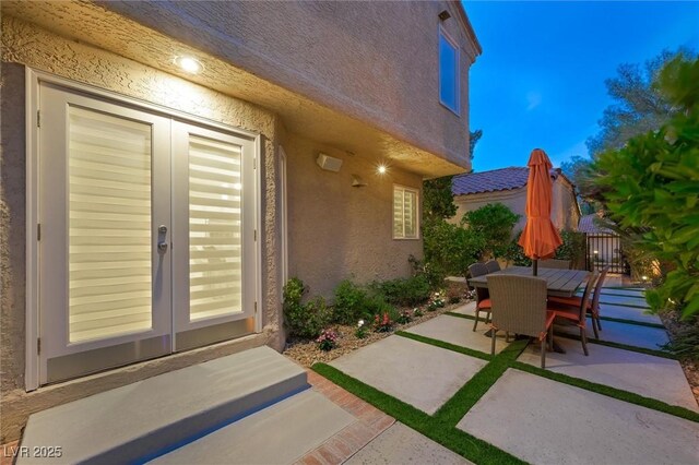 5125 Turnberry Ln, Las Vegas, NV 89113 - view of patio / terrace with outdoor dining space and french doors