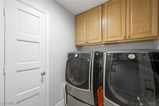5125 Turnberry Ln, Las Vegas, NV 89113 - laundry room featuring cabinet space, washer and clothes dryer, and baseboards