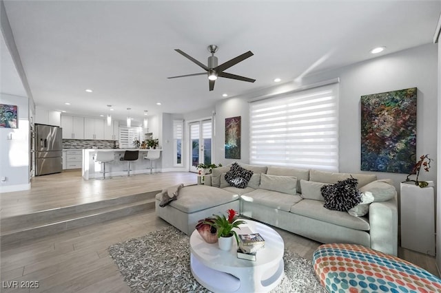 5125 Turnberry Ln, Las Vegas, NV 89113 - living area with ceiling fan, light wood-style flooring, and recessed lighting