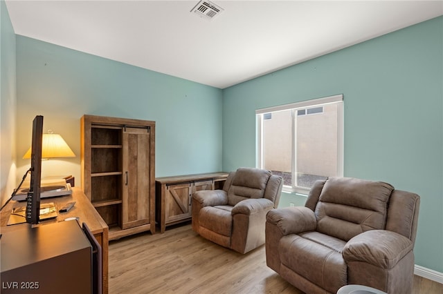 2069 Colvin Run Dr, Henderson, NV 89052 - sitting room featuring light wood-type flooring and an office area