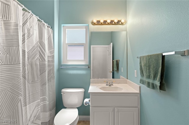 2069 Colvin Run Dr, Henderson, NV 89052 - full bathroom featuring vanity, toilet, and a shower with shower curtain