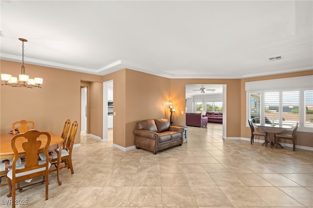 2069 Colvin Run Dr, Henderson, NV 89052 - dining space with a chandelier, ceiling fan, baseboards, and light tile patterned floors