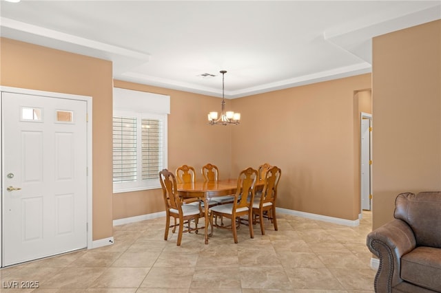 2069 Colvin Run Dr, Henderson, NV 89052 - dining area with a chandelier, baseboards, and a tray ceiling