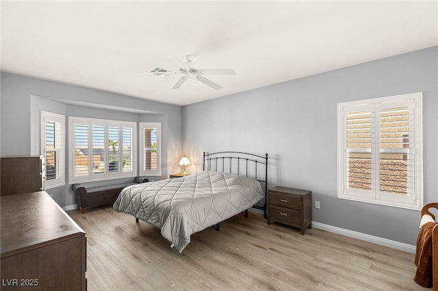 2069 Colvin Run Dr, Henderson, NV 89052 - bedroom featuring light wood finished floors, baseboards, and a ceiling fan