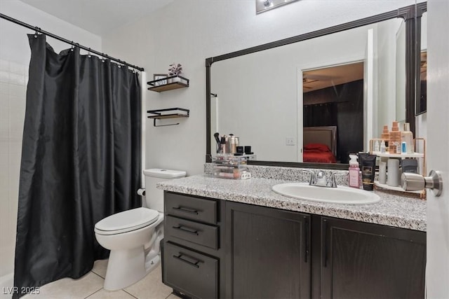 5184 Mineral Lake Dr, Las Vegas, NV 89122 - bathroom with tile patterned flooring, vanity, toilet, curtained shower, and connected bathroom