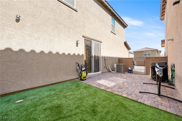 1023 Brilliant Meadow Ave, North Las Vegas, NV 89086 - view of patio / terrace with central AC and a gate