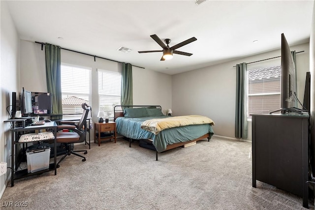 1023 Brilliant Meadow Ave, North Las Vegas, NV 89086 - carpeted bedroom with a desk and ceiling fan