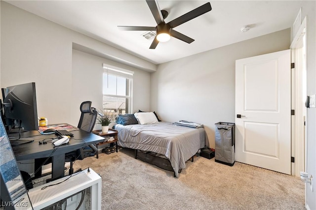 1023 Brilliant Meadow Ave, North Las Vegas, NV 89086 - bedroom with light carpet, an office area, and ceiling fan