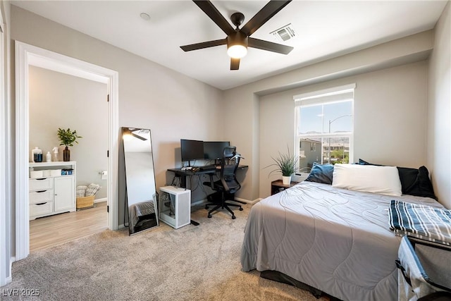 1023 Brilliant Meadow Ave, North Las Vegas, NV 89086 - carpeted bedroom with baseboards, a desk, and ceiling fan