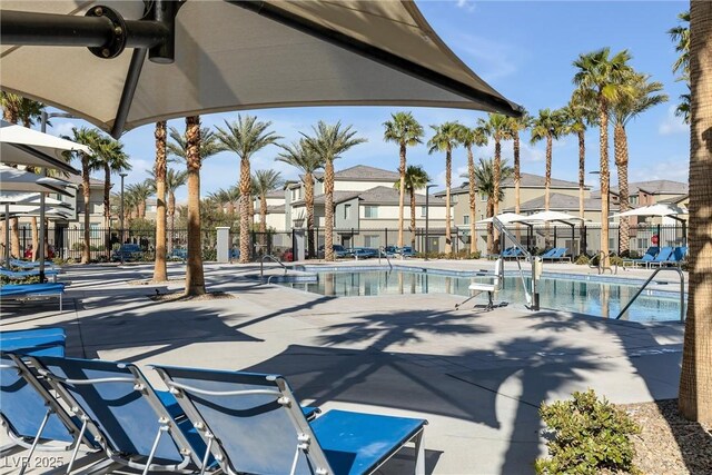 2846 Cerulean Stars Ln Unit 1, Las Vegas, NV 89183 - community pool featuring a residential view, fence, and a patio