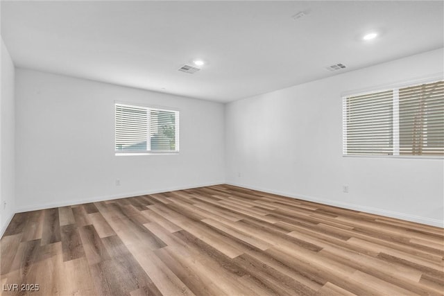 2846 Cerulean Stars Ln Unit 1, Las Vegas, NV 89183 - spare room featuring wood finished floors, recessed lighting, and baseboards