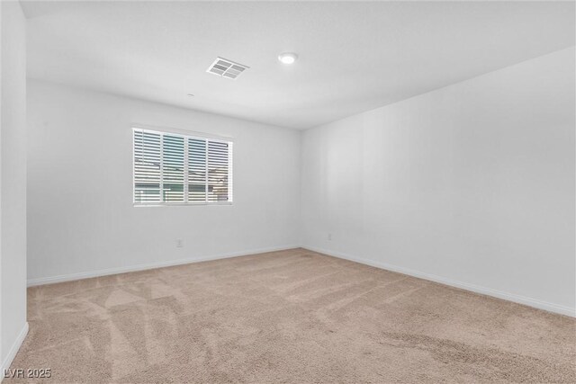 2846 Cerulean Stars Ln Unit 1, Las Vegas, NV 89183 - spare room featuring carpet floors and baseboards