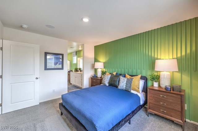 7935 Pandora Sky St Unit 381, North Las Vegas, NV 89084 - bedroom featuring carpet floors, baseboards, and connected bathroom