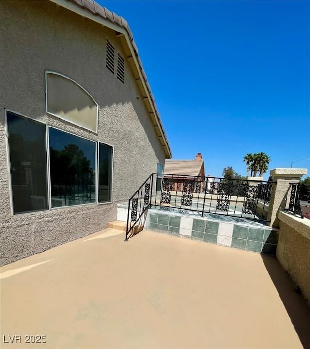 8397 San Ramon Dr, Las Vegas, NV 89147 - view of patio featuring a balcony