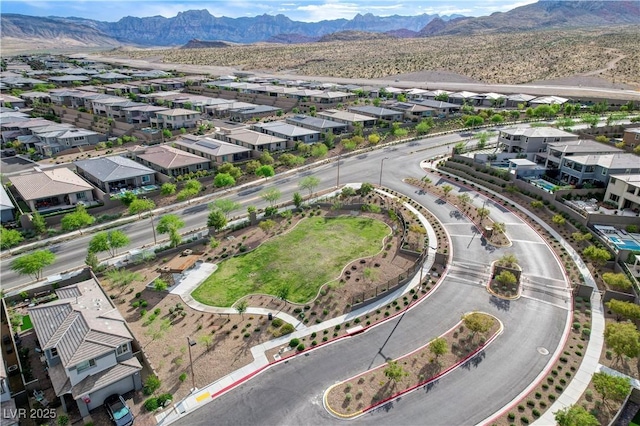 aerial perspective of suburban area featuring a mountainous background