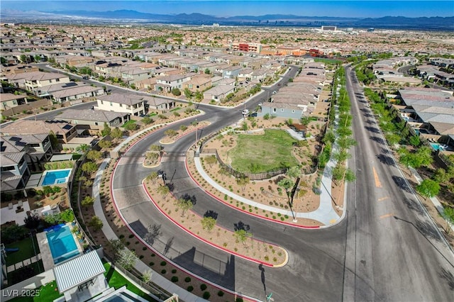 aerial perspective of suburban area with mountains