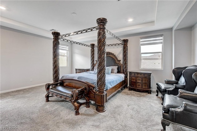bedroom featuring carpet, baseboards, a raised ceiling, and recessed lighting