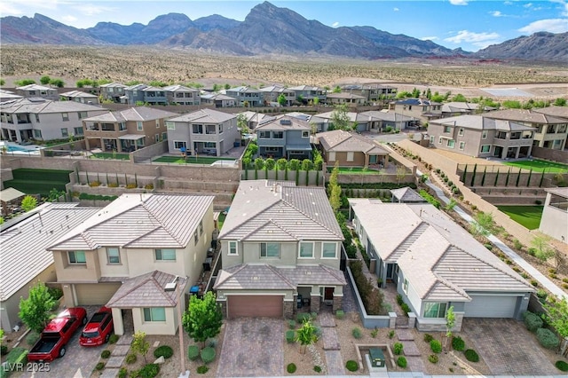 aerial perspective of suburban area with a mountain backdrop