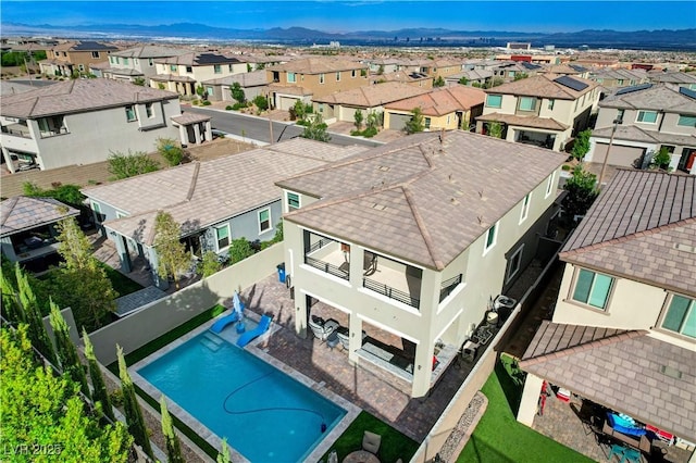 aerial view of residential area with a mountain backdrop