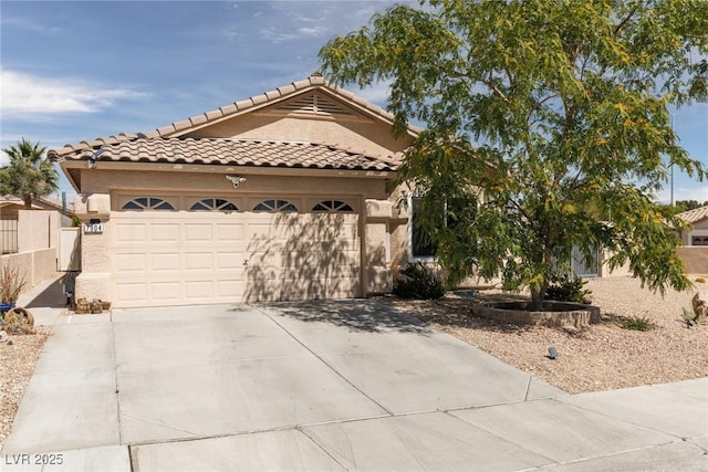 7904 Seabourn Ct, Las Vegas, NV 89129 - view of front of property with driveway, a garage, a tile roof, and stucco siding