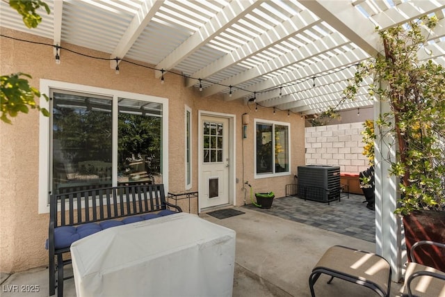 7904 Seabourn Ct, Las Vegas, NV 89129 - view of patio with central AC unit, a pergola, and outdoor lounge area