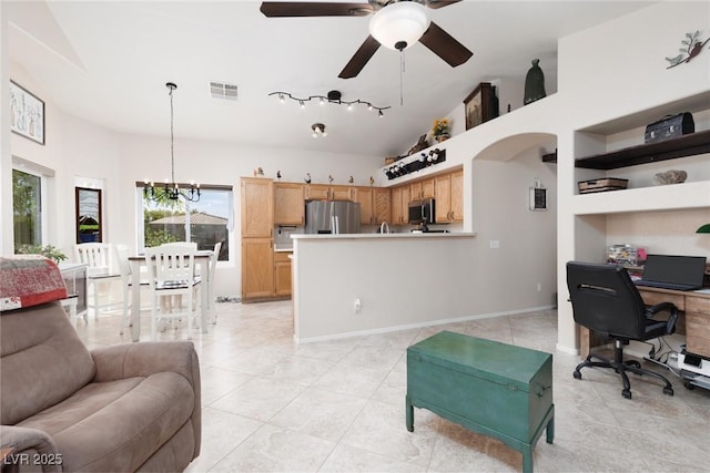 7904 Seabourn Ct, Las Vegas, NV 89129 - living area featuring plenty of natural light, a chandelier, ceiling fan, an office area, and high vaulted ceiling