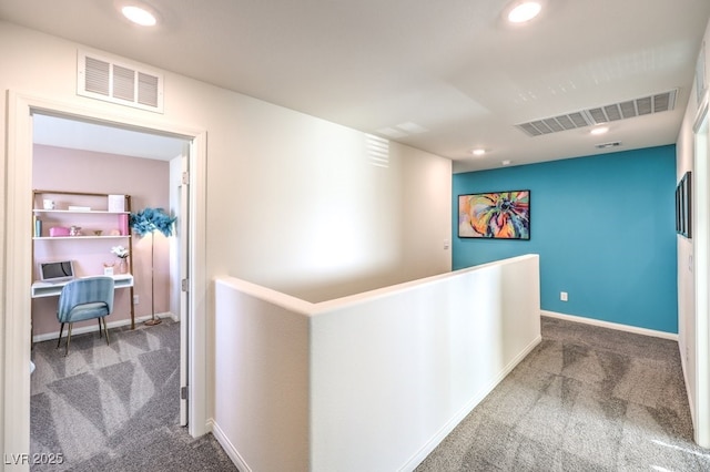 6521 Cinnamon Hazelnut St Lot 91, North Las Vegas, NV 89084 - hall featuring carpet floors, recessed lighting, a desk, baseboards, and an upstairs landing