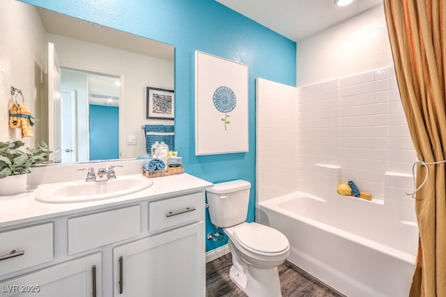 6521 Cinnamon Hazelnut St Lot 91, North Las Vegas, NV 89084 - full bath featuring toilet, vanity, wood finished floors, washtub / shower combination, and a textured wall