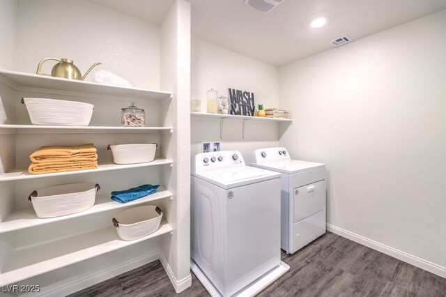 6521 Cinnamon Hazelnut St Lot 91, North Las Vegas, NV 89084 - laundry room featuring washing machine and clothes dryer, baseboards, and wood finished floors