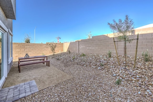 6521 Cinnamon Hazelnut St Lot 91, North Las Vegas, NV 89084 - fenced backyard with a patio area