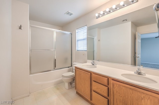11177 Deluna St, Las Vegas, NV 89141 - full bathroom with double vanity, toilet, and enclosed tub / shower combo