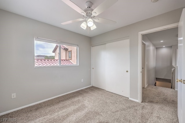 11177 Deluna St, Las Vegas, NV 89141 - unfurnished bedroom featuring carpet, a closet, baseboards, and ceiling fan
