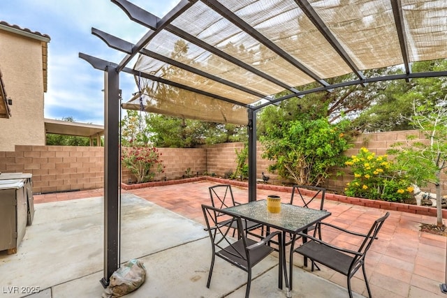 11177 Deluna St, Las Vegas, NV 89141 - view of patio / terrace with a fenced backyard, outdoor dining space, and a pergola
