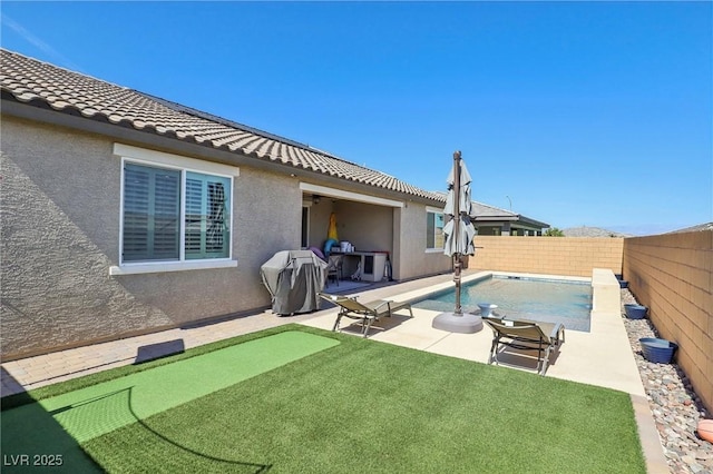 716 Cadence View Way, Henderson, NV 89011 - view of pool with a fenced backyard, an area to practice putting, a patio area, and area for grilling