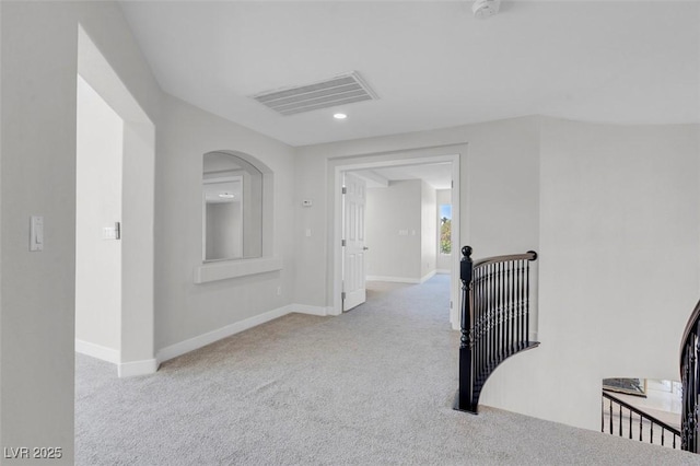 3604 N Campbell Rd, Las Vegas, NV 89129 - hallway with carpet flooring, baseboards, arched walkways, recessed lighting, and an upstairs landing