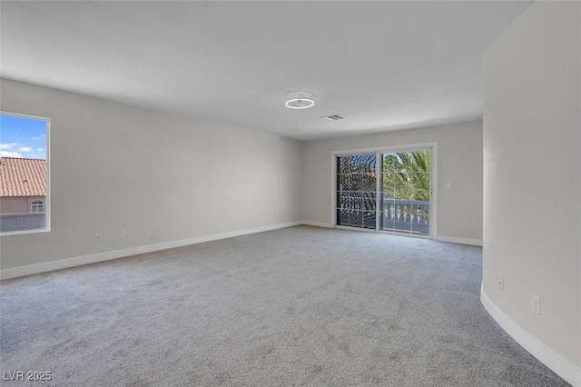 3604 N Campbell Rd, Las Vegas, NV 89129 - carpeted spare room featuring baseboards