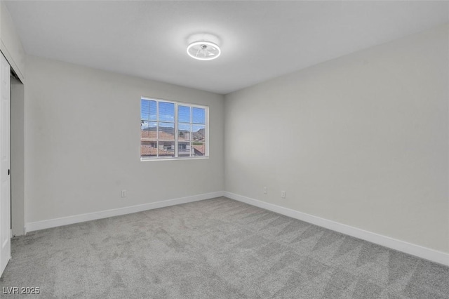 3604 N Campbell Rd, Las Vegas, NV 89129 - unfurnished bedroom featuring carpet, baseboards, and a closet