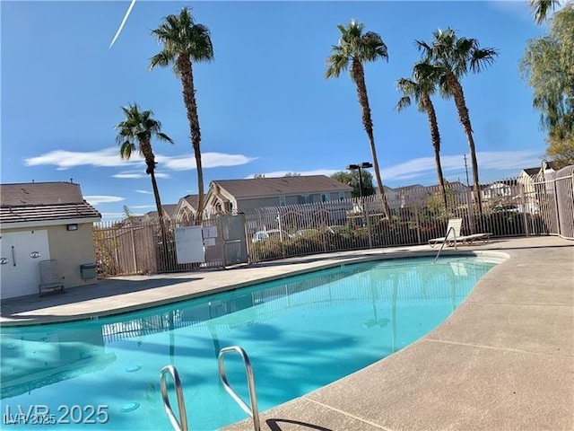 4675 Color Up Ct Unit 101, Las Vegas, NV 89122 - community pool with fence, a residential view, and a patio