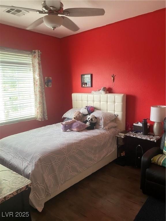 8913 Cambridge Glen Ct, Las Vegas, NV 89149 - bedroom featuring wood finished floors and a ceiling fan