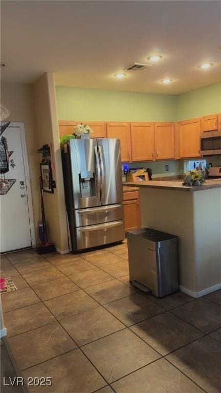 8913 Cambridge Glen Ct, Las Vegas, NV 89149 - kitchen with stainless steel appliances, light tile patterned floors, and recessed lighting