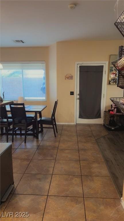 8913 Cambridge Glen Ct, Las Vegas, NV 89149 - dining area featuring tile patterned floors and baseboards