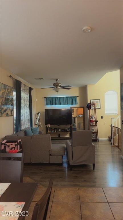 8913 Cambridge Glen Ct, Las Vegas, NV 89149 - tiled living area with ceiling fan and baseboards