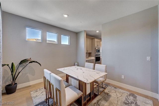 7572 Mount Spokane Ct, Las Vegas, NV 89113 - dining area featuring baseboards, light wood-style floors, and recessed lighting