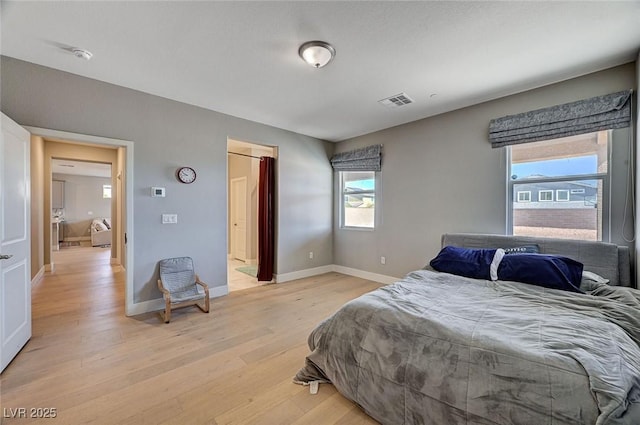 7572 Mount Spokane Ct, Las Vegas, NV 89113 - bedroom with light wood-style flooring and baseboards