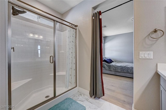7572 Mount Spokane Ct, Las Vegas, NV 89113 - ensuite bathroom featuring a shower stall and vanity