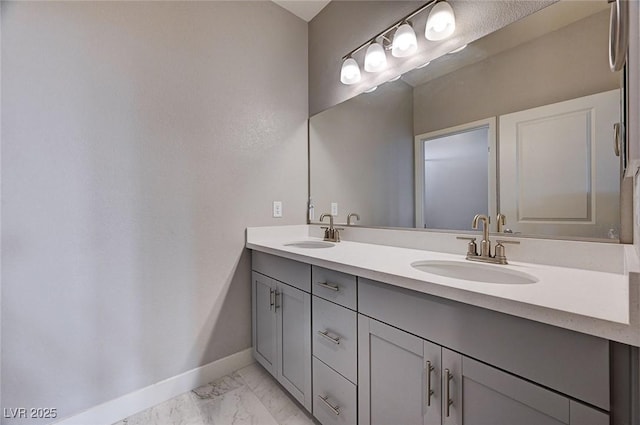 7572 Mount Spokane Ct, Las Vegas, NV 89113 - full bathroom with baseboards, marble finish floors, and double vanity